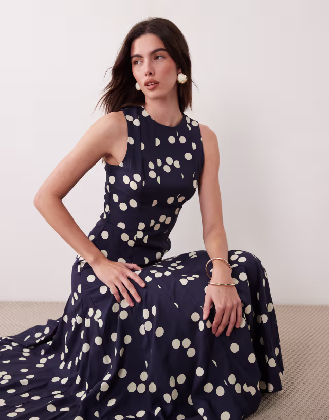 ASOS DESIGN racer neck maxi dress with godets in navy polka dots