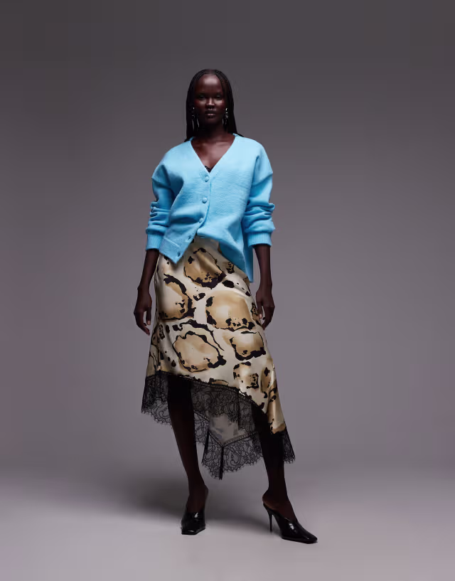 ASOS DESIGN satin asymmetric lace trim skirt in animal print